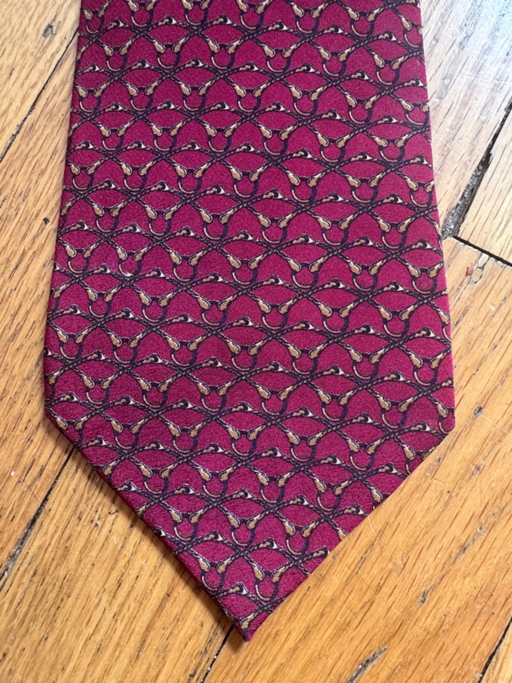 Bally Burgundy Silk Tie with Gold and Black Motif